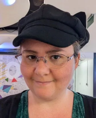 Cait, the Office Assistant